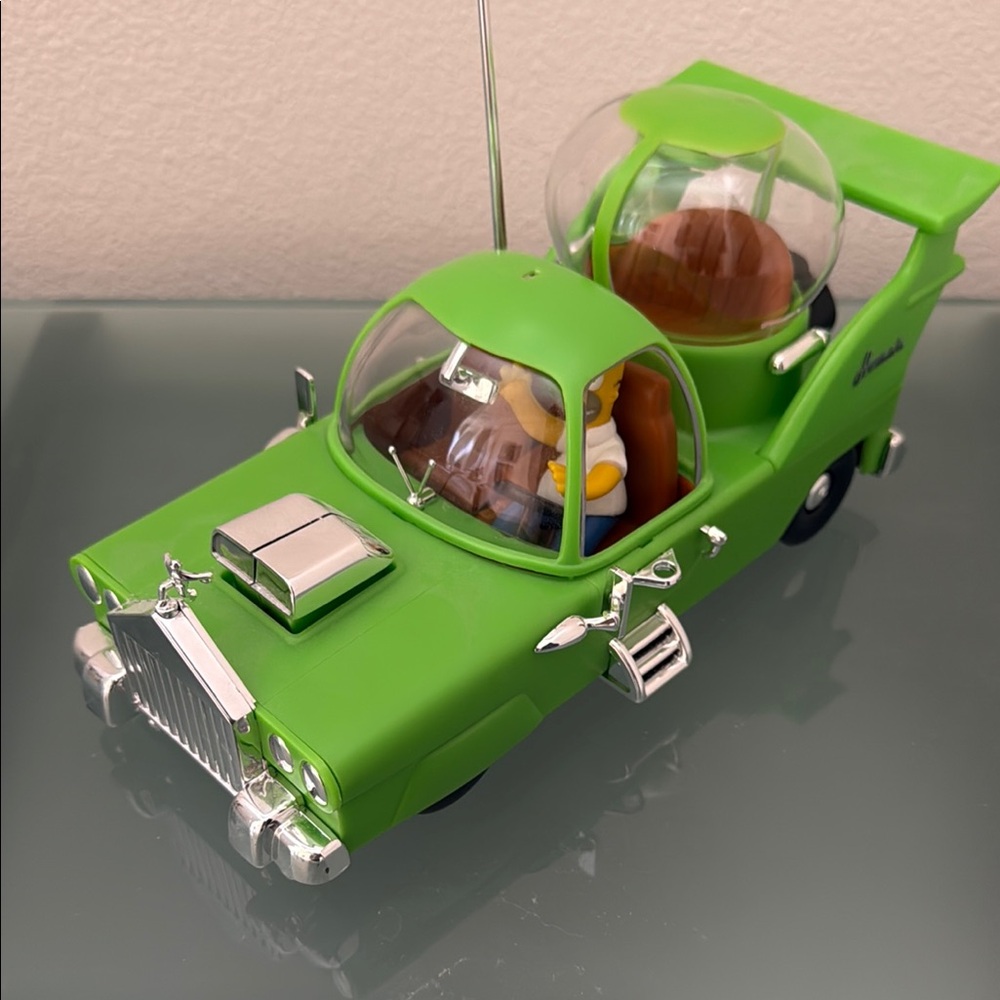 The Simpsons “ The Homer “ Green and Silver Plastic Snap Toy Car